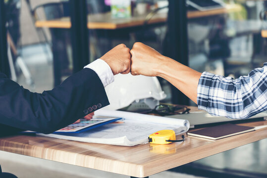 Group of multiracial fist bump hands stack join hands together. Partner Business Trust Teamwork Partnership. Industry contractor fist bump dealing mission business. Business industry trust teamwork.