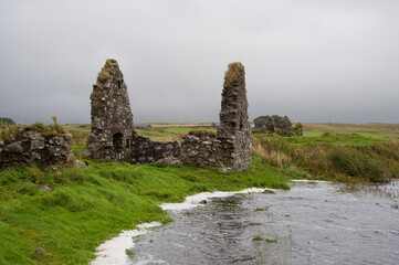 Historic stone ruins at Finlaggan on Eilean Mòr, Islay, Scotland © Jaime