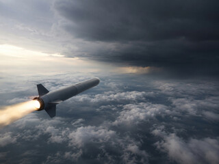 Fototapeta premium Guided Missile Flying Above Clouds Toward Dark Storm Front