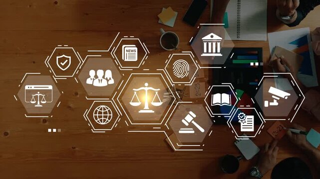 Diverse Business Meeting Focused on Law, Technology, and Data Analysis with Digital Icons Representing Justice, Security, and Communication Gluon.