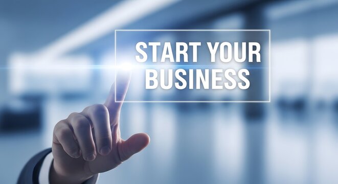 Business start up concept hand pressing 'start your business' button