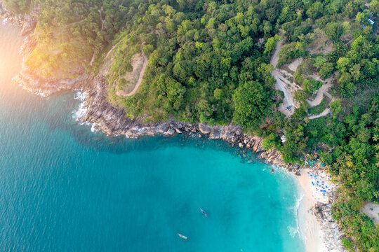 Aerial Phuket bay serene turquoise water, lush jungle. Perfect for vacation Freedom coral reef exploration