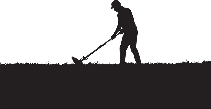 Silhouette of a man digging with a shovel in a field