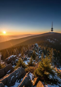 Stunning Sunrise over Praded Mountain with Communication Tower and Snowy Rocks in Jeseniky Mountains, Czech Republic