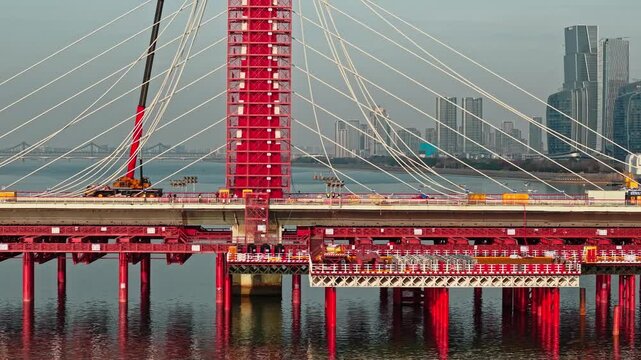 Dismantling of a bridge in Hangzhou, China using cranes and barges.