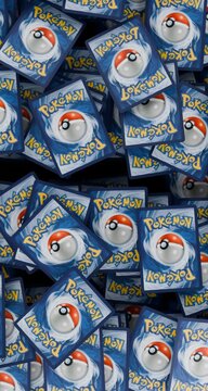 Pile of English Pokemon Trading Cards, reverse side. Pokemon TCG Collecting
