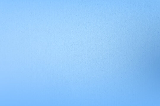 Simple baby light cool blue tone color paint on paper texture background minimal style 