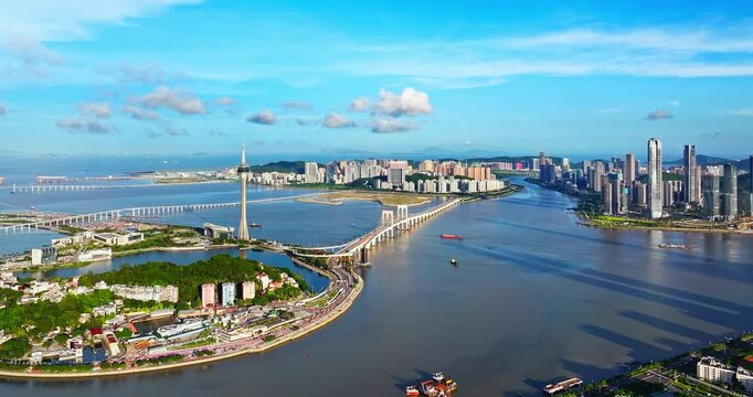 Aerial view of Macau Tower and Sai Van Bridge spanning the water in Macau, China