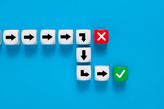 guiding arrows with cross and check mark symbol. isolated on blue background. concept of business strategy avoid mistakes to achieve goal