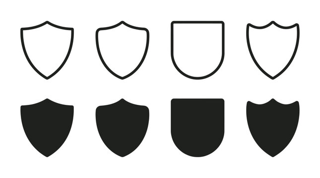 Various black and white shield icons in different styles and shapes for protection and security designs