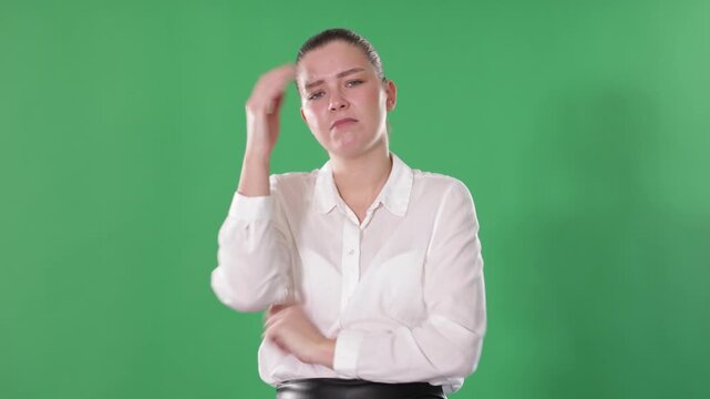 Upset and distressed girl person, regrets what happened, worries. Frustrated person, setback, or bad day on green screen background. Advertising space, copy space, isolated human figure. 