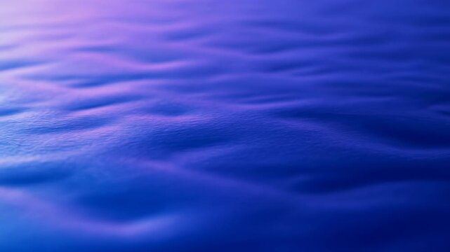 serene underwater ripples and waves on a calm water surface near the top of the scene, creating a tranquil nature background with blue and purple hues in a top-down perspective.