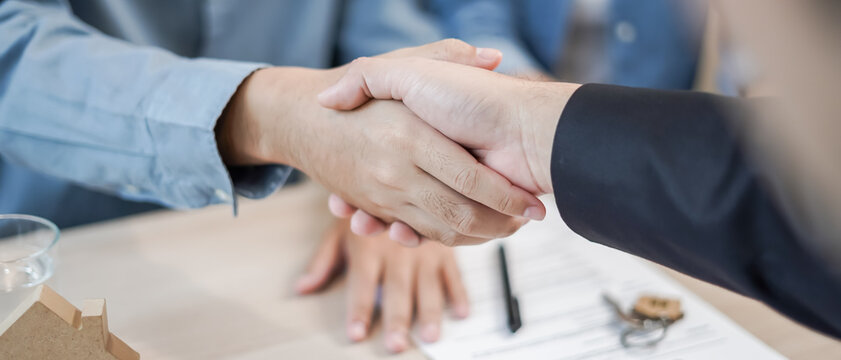 lease, rental and selling home. Dealership manager smile handshake to the new homeowner. rent house, Sales, loan credit financial, insurance, Seller, dealer, installment