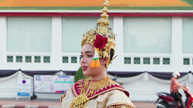 Traditional Thai Khon Dancers in Ornate Costumes at Wat Suthat Temple