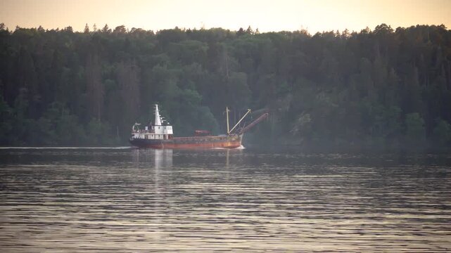 Stockholm, Sweden A cargo ship passes in Lake Malaren