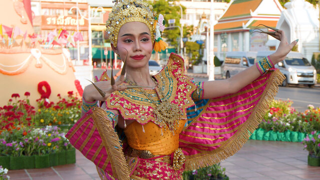 Thai Khon Dancer in Ornate Costume Performing at Wat Suthat