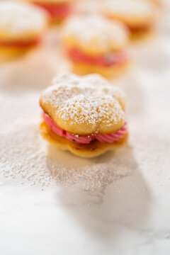 Lemon Spritz Cookie Sandwich with Cranberry Buttercream