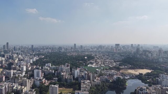High angle drone panorama of the Karail slum settlement and Gulshan skyline