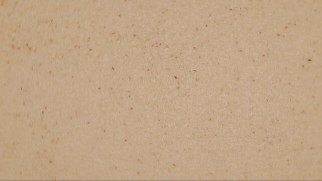 Rotation of semolina as a texture close-up