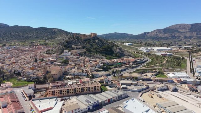 Wide drone view of Castalla Castle above the town in Alicante Province, Spain.