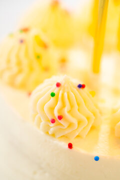 Candles and Piped Frosting on Cake Top