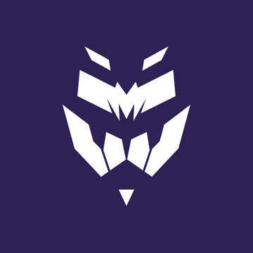 Stylized geometric lion face with sharp angles on dark background