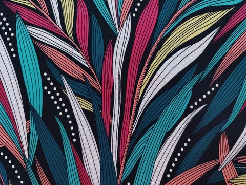 Texture de tissu &agrave; motif de plumes color&eacute;es &ndash; fond textile graphique et moderne