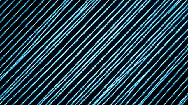 Dense parallel blue dotted light lines texture.