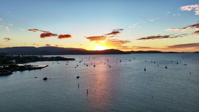 Spectacular aerial sunset of Airlie Beach Whitsundays Queensland Australia