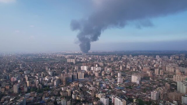 High drone view of massive black smoke from a huge fire at Dhaka airport