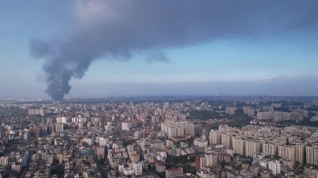 High drone view of massive black smoke from a huge fire at Dhaka airport