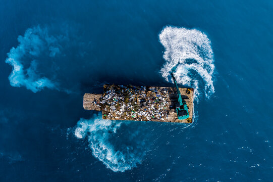 Maledives, South-Male-Atoll, plastic waste disposal with digger from above