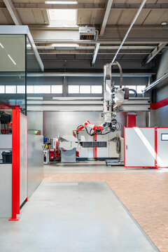 Modern industrial robot inside an automated manufacturing plant