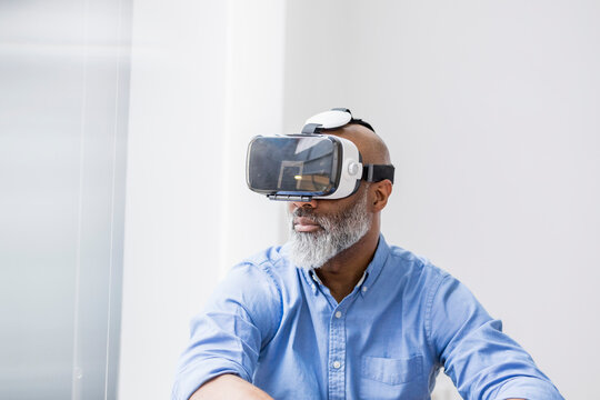 Businessman using Virtual Reality Glasses