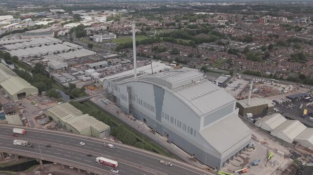 Aerial drone view showing the scale of a modern waste-to-energy facility beside the M5 motorway in the West Midlands, England.
