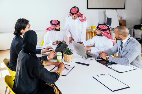 Diverse business team having a corporate meeting in a Riyadh office