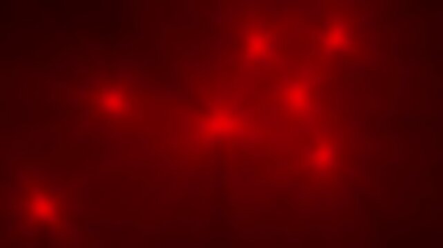 Paparazzi flashes of cameras on a black background. Camera flashes light animation overlay. Abstract Red Bokeh Lights Glowing in Dark Atmosphere