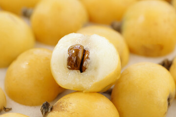 Fresh Suzhou White Jade Loquat Fruits Spring Harvest Clean Background © CaoVan