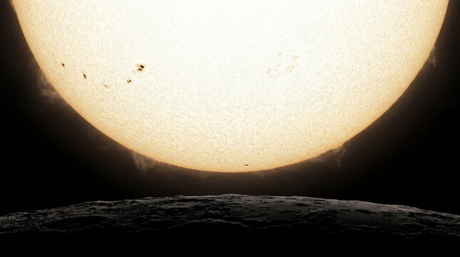 Sun rising above a rocky planetary horizon with visible sunspot activity