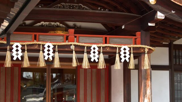 Traditional Shimenawa Rope and Shide Paper Tassels on Japanese Shrine