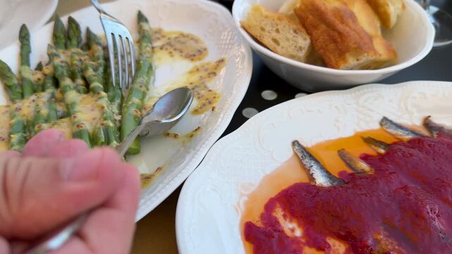 Gourmet European Appetizers with Anchovies Asparagus and Mustard Sauce