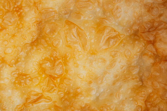 Crimean Tatar fried pastry crust close up