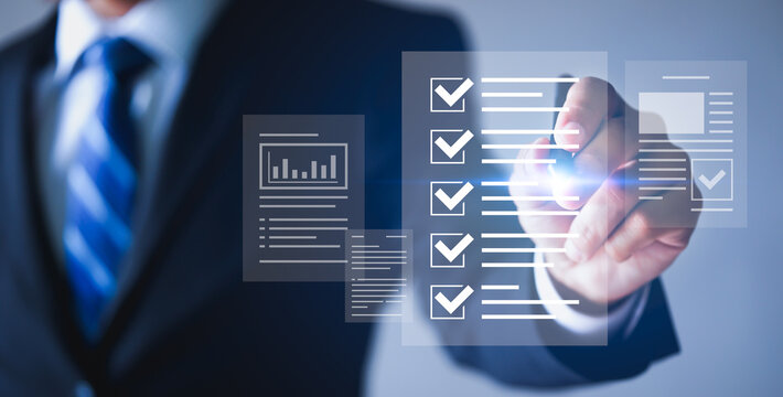 Businessman checking digital checklist on virtual screen. Checklist concept