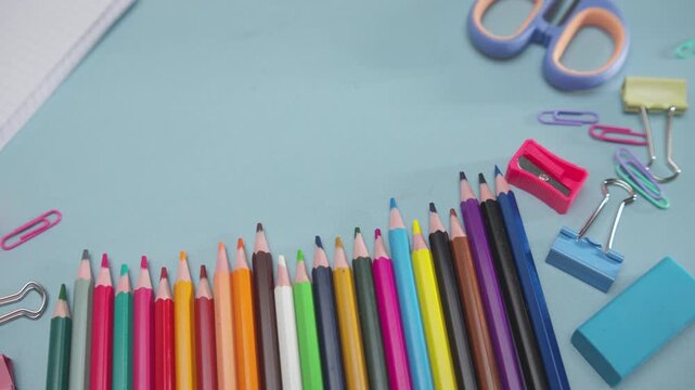 School Supplies Arranged Around an Open Squared Notebook with Large Copy Space, Perfect for Back to School Promotions, Education, Study, and Classroom Designs