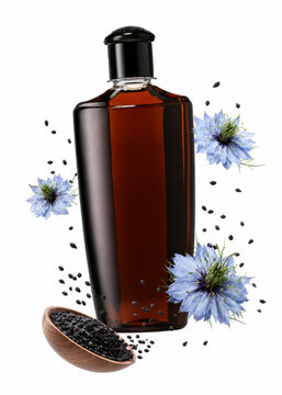 Black Seed Oil Bottle And Nigella Seeds