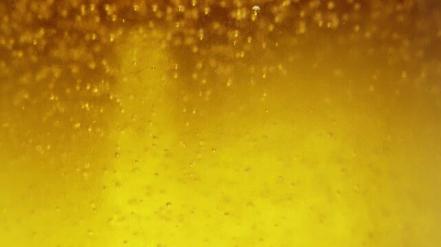 close up of beer bubbles
