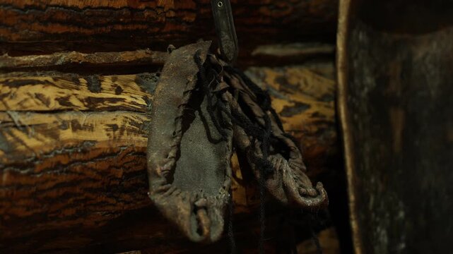 Aged leather footwear evokes nostalgic rustic cottage environment