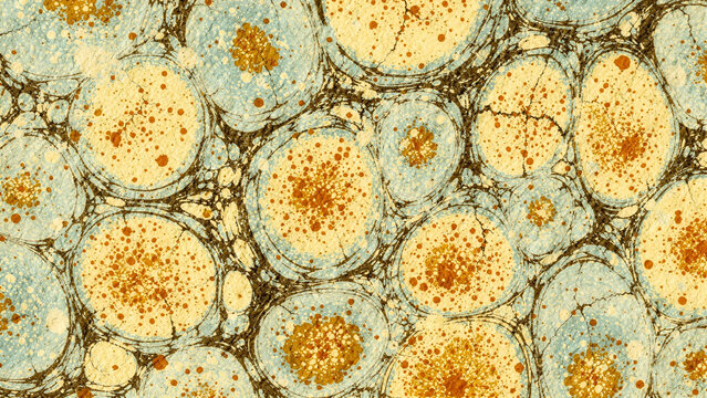 high resolution full frame abstract macro background of traditional Turkish marbling art featuring yellow and blue cellular patterns
