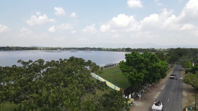 Aerial view of Mulur Reservoir, a natural tourist destination and reservoir, a Dutch heritage site built in 1926 in Sukoharjo, Central Java, Indonesia.