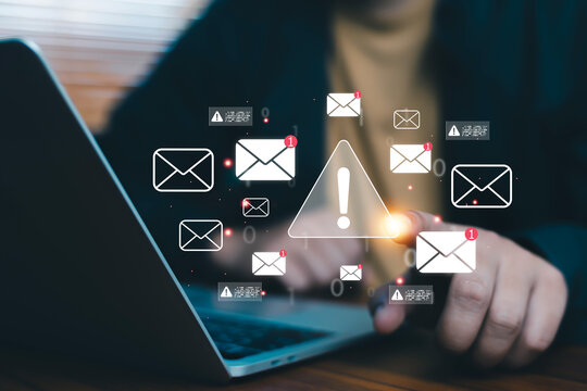 Business professional managing high volumes of email notifications through a digital inbox interface, illustrating inbox monitoring, notification management, communication workflow organization